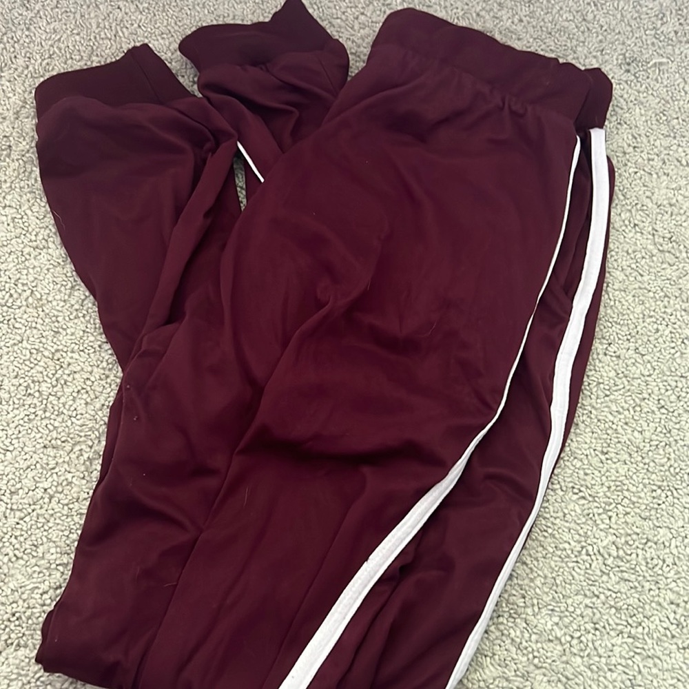 Burgundy sweatpants with white line